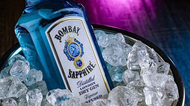 A bottle of Bombay Sapphire gin in an ice bucket.