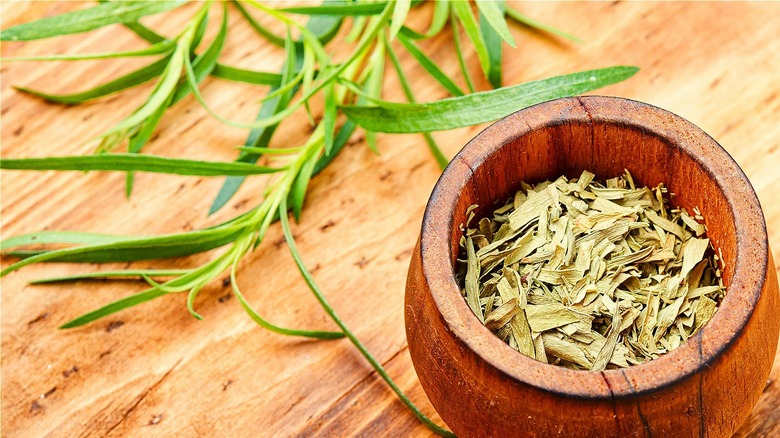 Dried tarragon in a bowl