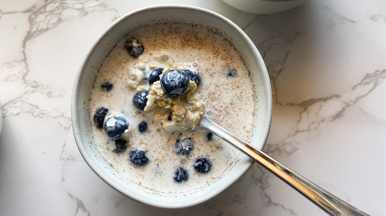 bowl of overnight oats with blueberries