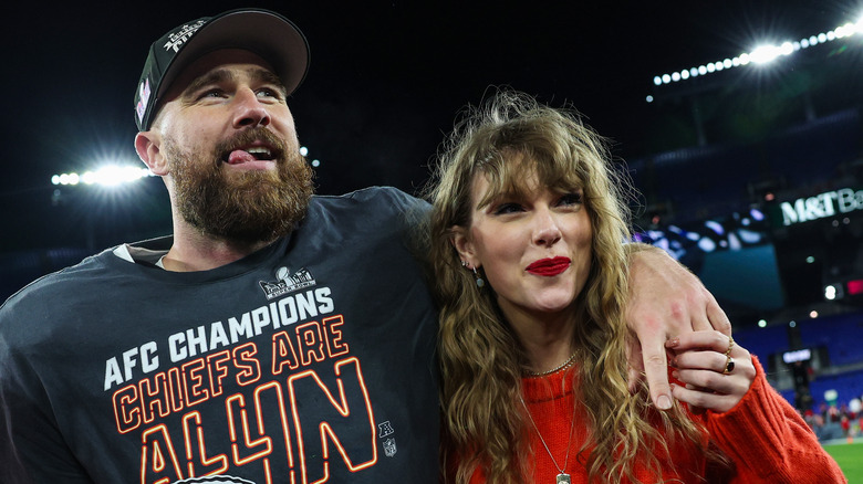 Swift and kelce on field
