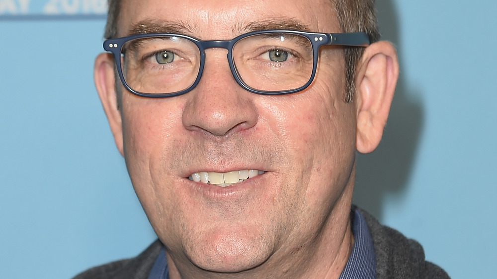 Ted Allen against blue background