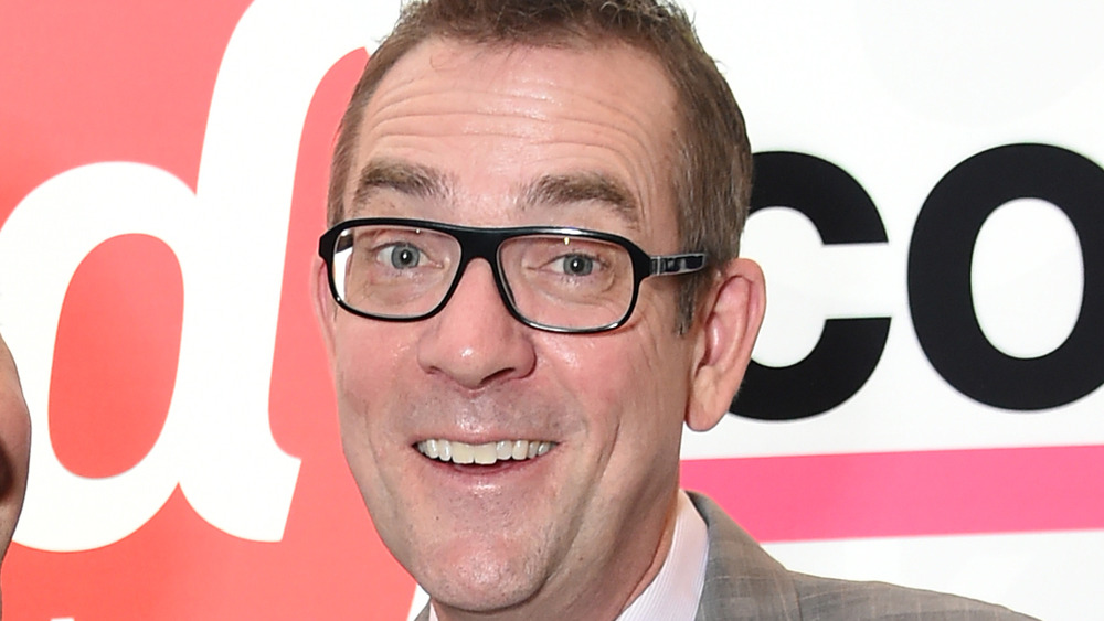 Ted Allen in black glasses