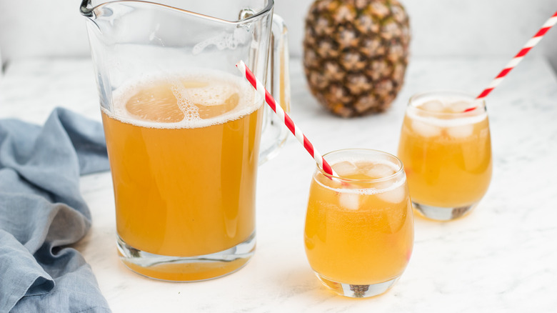 glasses and pitcher of tepache