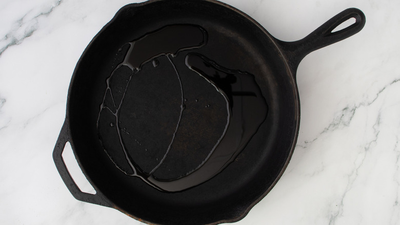 oil heating in cast iron skillet