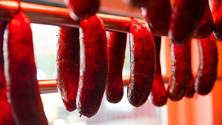 Sausage links smoking at The Pit Room in Houston, Texas.