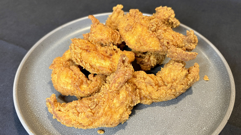 A plate of Texas Roadhouse fried chicken fingers