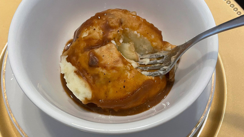 Texas Roadhouse mashed potatoes in bowl with fork