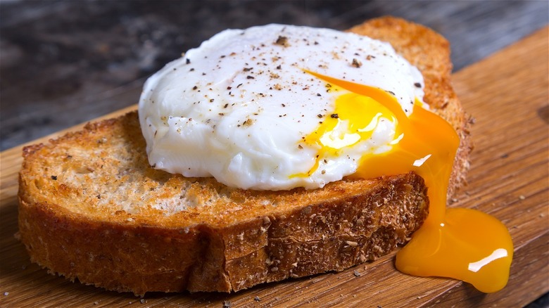 Beautiful poached egg on toast