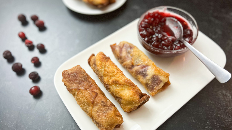 egg rolls and cranberry sauce