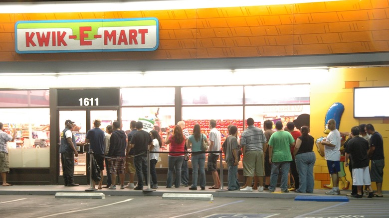 people lined up at Kwik-E-Mart