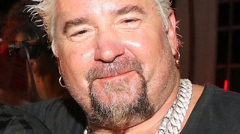 Guy Fieri with slight smile