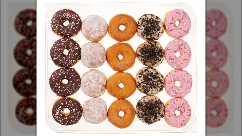 Plastic container with 20 donuts in five flavors.