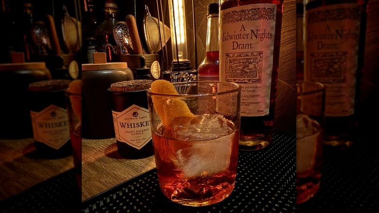 An old fashioned cocktail and a bottle of High West's port finished whiskey