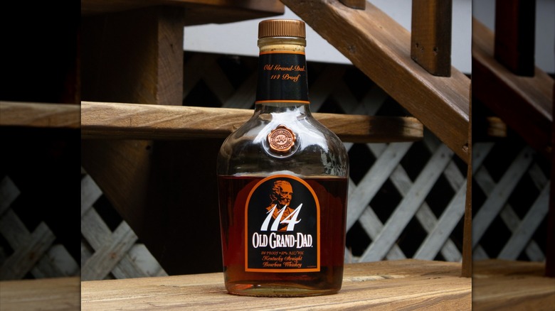 Bottle of Old Grand-Dad 114 on some wooden steps