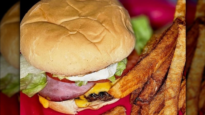 a burger with house cut fries
