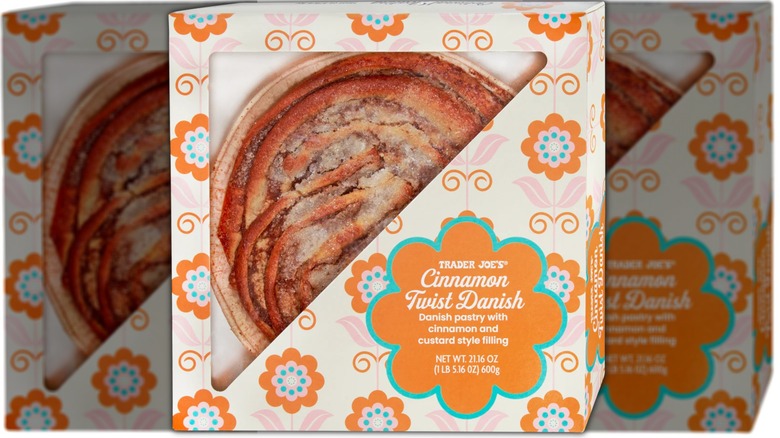 box containing a cinnamon Danish