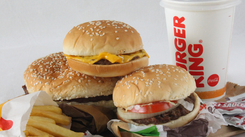 Burger King burgers with fries and soft drink