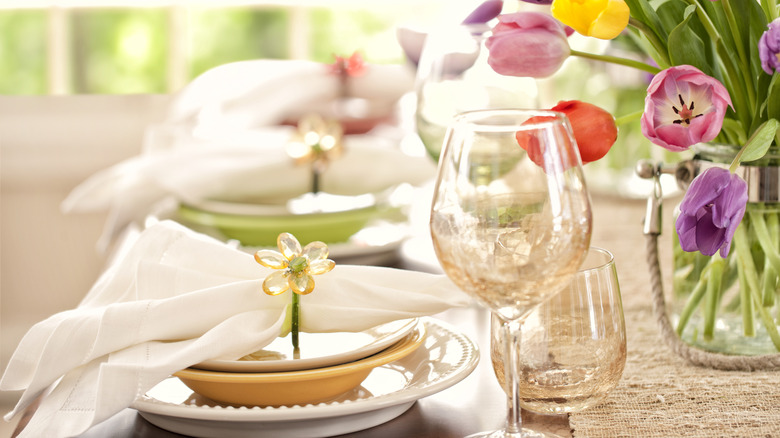 Festive spring dining room table with vibrant tulips.