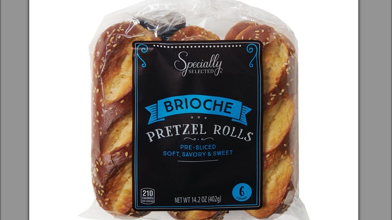 Clear bag of Specially Selected Brioche Pretzel Rolls with black and blue label