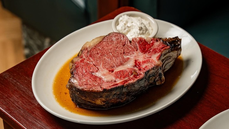 Prime rib served with horseradish cream sauce at 801 Chophouse