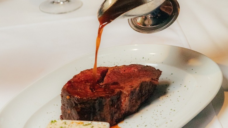 Prime rib topped with au jus at Durant's