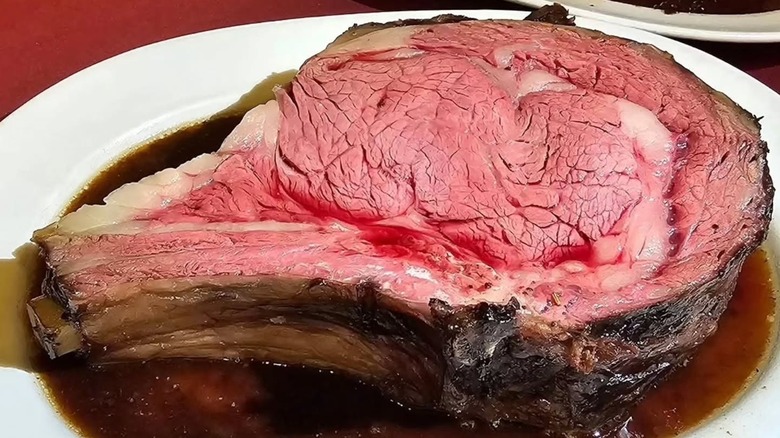 The prime rib served with au jus at Ward's House of Prime