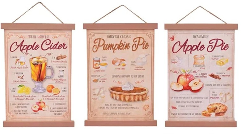 Vintage recipe wall signs reading apple cider, pumpkin pie and apple pie