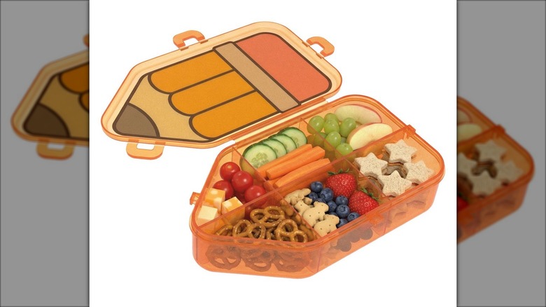 A pencil-shaped snack storage box.