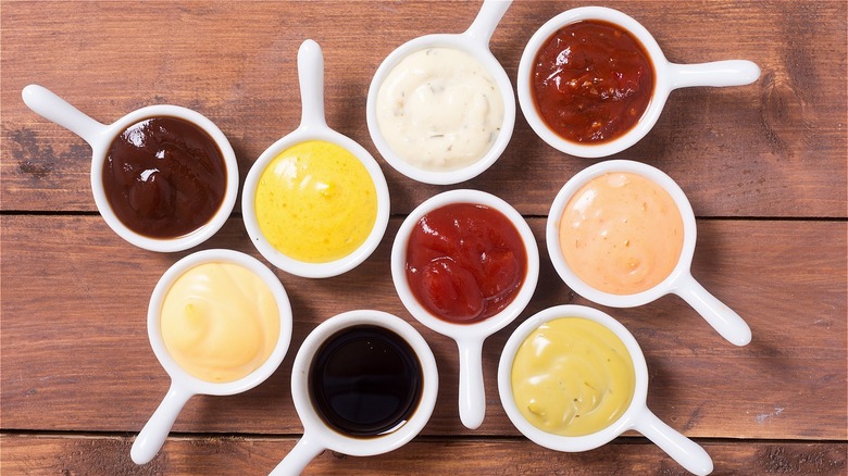 small dishes of various condiments
