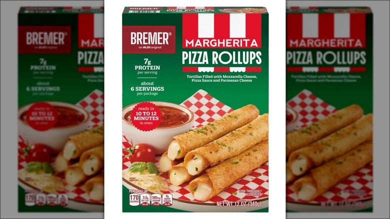 Box of rolled pizza appetizers against white background.