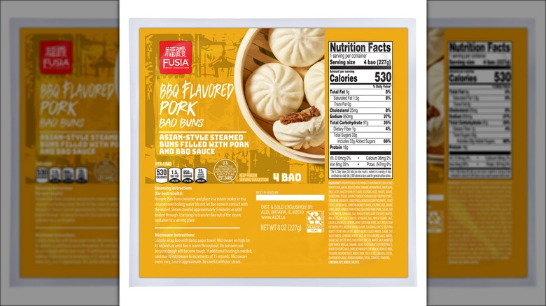 Pack of barbecue-flavored pork steamed buns against white background.