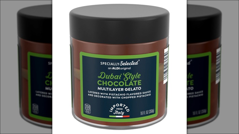Jar of Dubai chocolate-style gelato against white background.