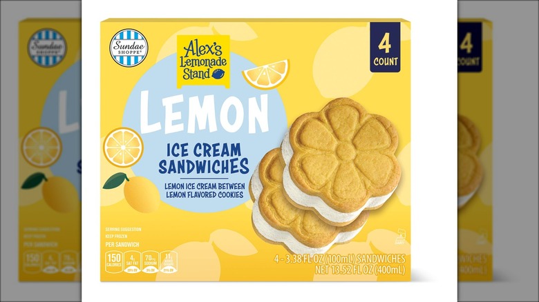 Package of lemon-flavored ice cream sandwiches against white background.