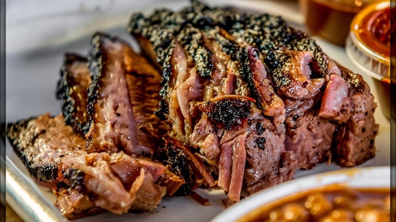 Juicy steak grilled and sliced on plate