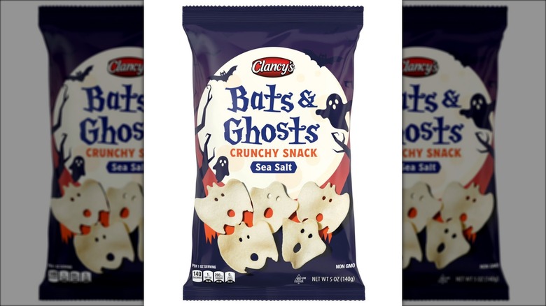 Bag of chips decorated with ghost- and bat-shaped chips and a big moon.