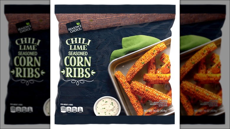 Bag reading "Chili Lime Seasoned Corn Ribs" with a picture of seasoned strips of corn and a side of dip.