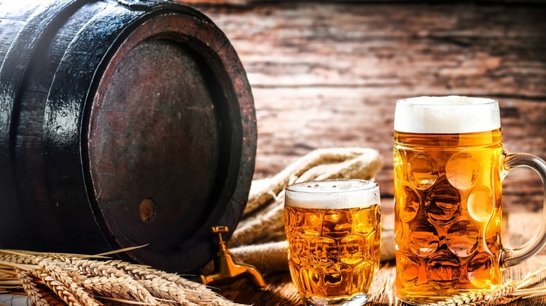 Two beer mugs and barrel
