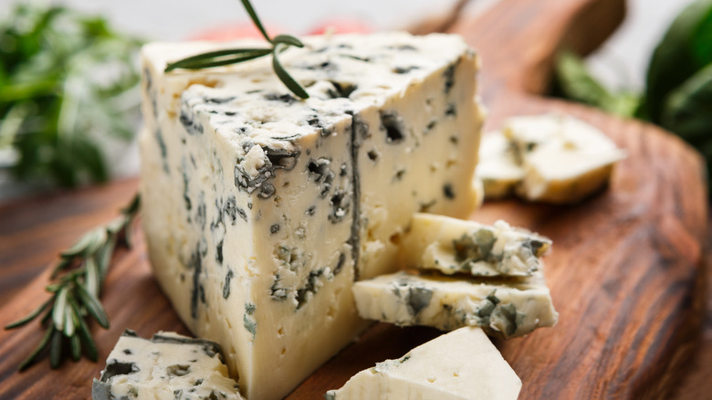 blue cheese on cutting board