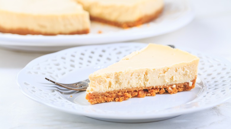 A slice of cheesecake ready to eat