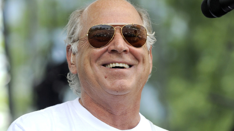 Jimmy Buffett performing at a concert