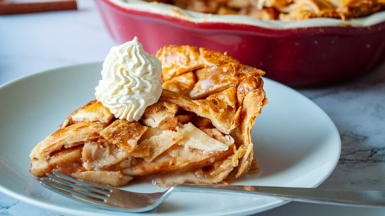 homemade apple pie with whipped cream