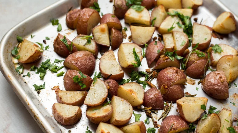 pan of roasted potatoes with garlic and rosemary