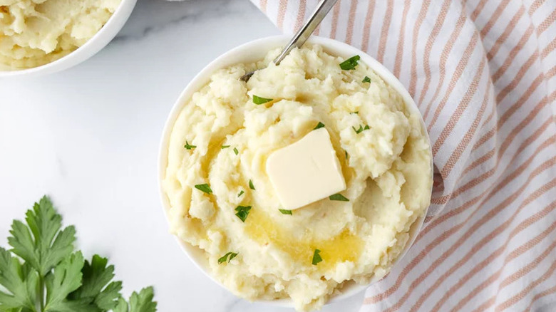 mashed potatoes with a red and white napkin
