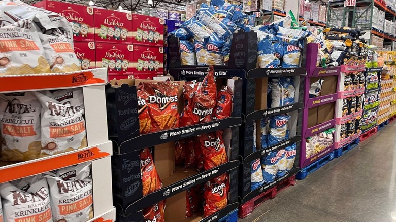 Chips and other snacks on display inside Costco.