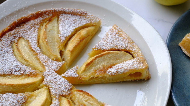 Sliced apple tart on plate