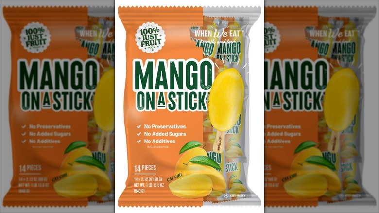 Bag of frozen mangoes on a stick.