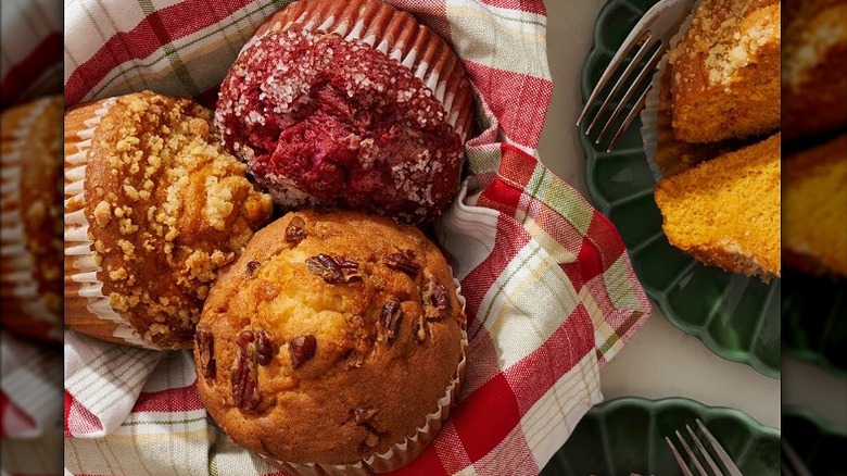 A variety of seasonal muffins from Member's Mark in bowl with cloth.