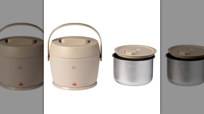 Components of electric food warmer from Aldi against white background.