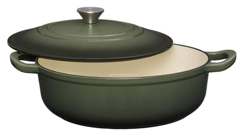 Green Dutch oven from Aldi against white background.