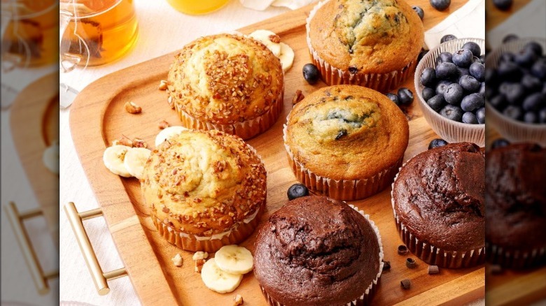 Member's Mark variety pack muffins displayed on cutting board with ingredients surrounding the board